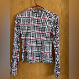 Cute, comfy, stretchy black, red, and white top.